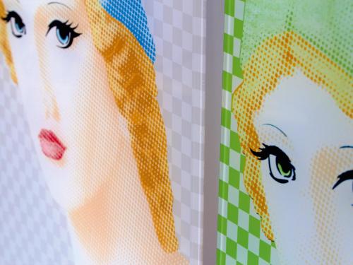 a close up of a face of a woman with blonde hair at Grecotel Pallas Athena in Athens