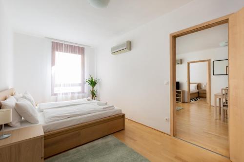 Posteľ alebo postele v izbe v ubytovaní Super central, 2-bedroom apartment with terrace