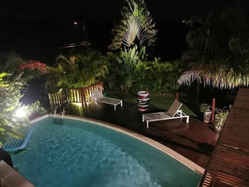 Вид на басейн у Villa de 4 chambres avec piscine privee jardin clos et wifi a Morne a l'Eau a 8 km de la plage або поблизу