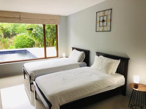 Gallery image of Pool Villas by Honey-5 miles from central Pattaya Beach in Nong Prue