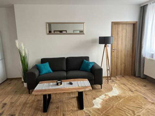 Coin salon dans l'établissement Apartmány U Jelena 3