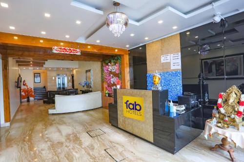 a lobby of a ted works store with a counter at FabHotel Winter Line Inn in Mussoorie