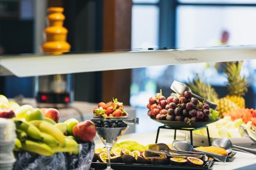 a buffet of fruits and vegetables on a table at La Mer Resort Spa Crete in Georgioupolis