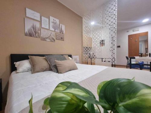 Posteľ alebo postele v izbe v ubytovaní Laura Home