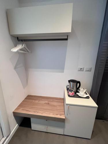 a kitchen with a counter with a coffee pot on it at Villa Chiara Taormina in Taormina