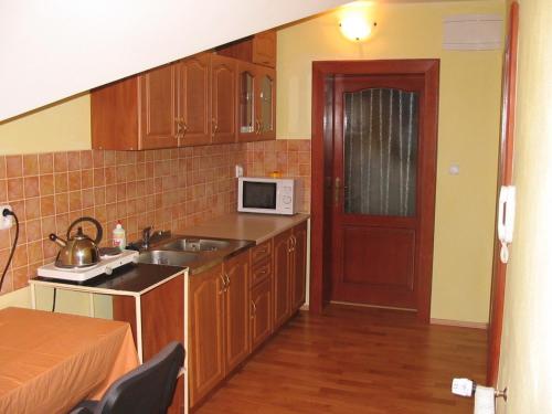 Kuchyň nebo kuchyňský kout v ubytování Privat Luptak