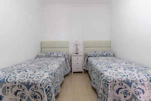 A bed or beds in a room at Apartamento Sussa 7A by HH