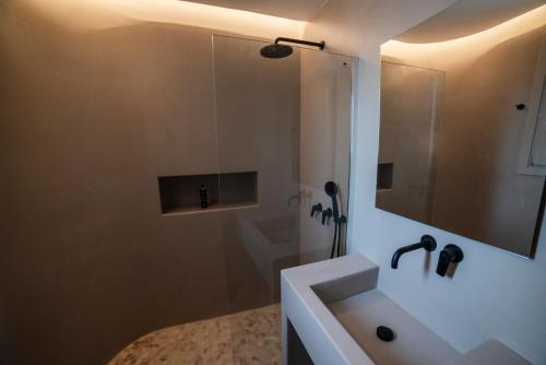 Kylpyhuone majoituspaikassa CAMPO SUITES