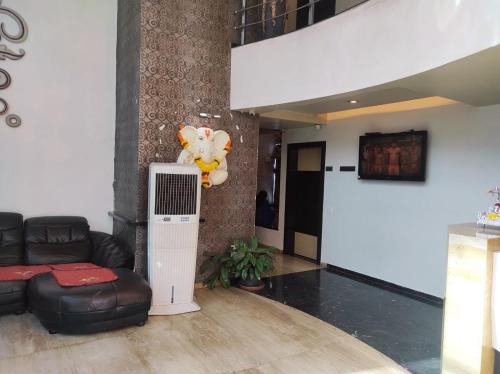Μια τηλεόραση ή/και κέντρο ψυχαγωγίας στο Hotel Vaishnavi