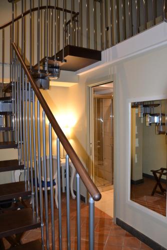 a staircase in a house with a stair case at Art & Jazz Hotel in Catania
