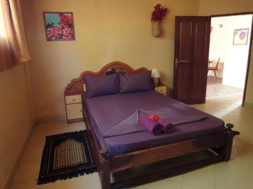 Voodi või voodid majutusasutuse Mango Lodge Gambia toas