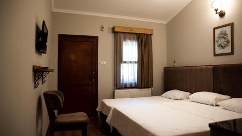 Postel nebo postele na pokoji v ubytování Fener Motel