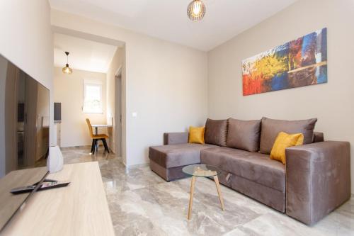 Una televisión o centro de entretenimiento en Apartments Posejdon Lux