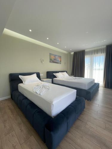 Katil atau katil-katil dalam bilik di Adria Hotel
