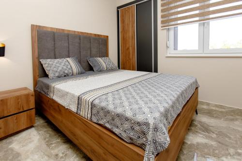 Cama o camas de una habitación en Apartments Posejdon Lux