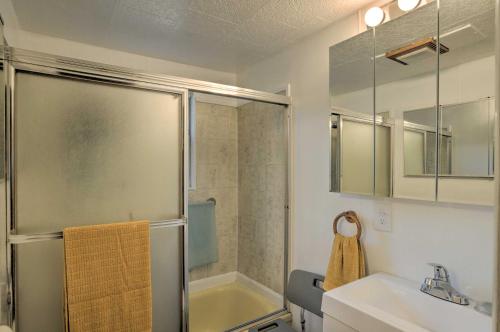 a bathroom with a shower and a sink at Cozy Klamath Falls Home Near Fishing and Parks! in Klamath Falls