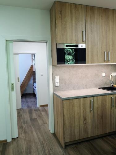 Η κουζίνα ή μικρή κουζίνα στο U Králíka, apartmán E, 50m od lanovky a bobové dráhy, parkování zdarma
