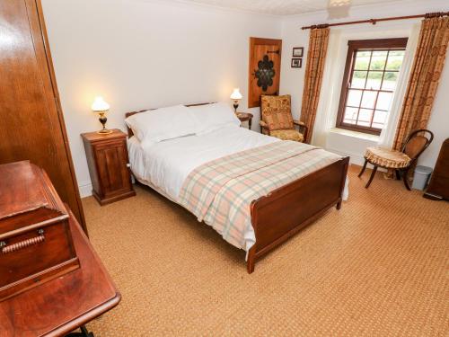 Postel nebo postele na pokoji v ubytování Penywhelp House