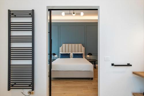 Voodi või voodid majutusasutuse Unico Relais toas