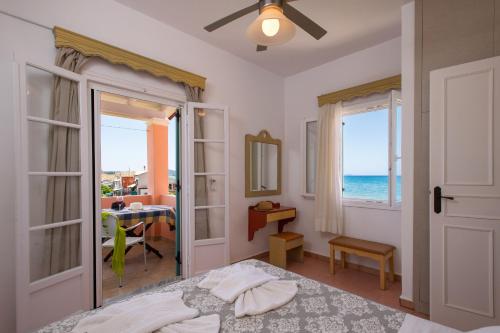 Ένα ή περισσότερα κρεβάτια σε δωμάτιο στο Vlachos Apartments Acharavi