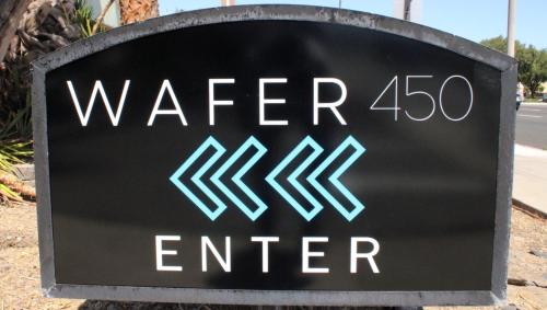 a sign for a water line center on a street at WAFER 450 Hotel in Santa Clara