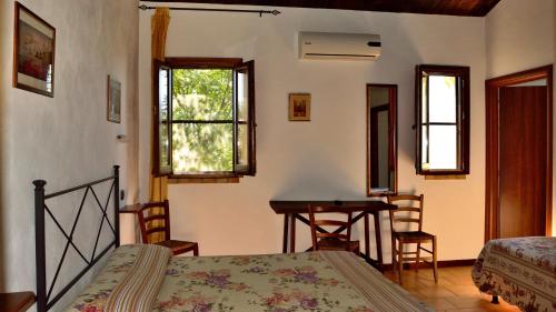Postel nebo postele na pokoji v ubytování Agriturismo Rivoli