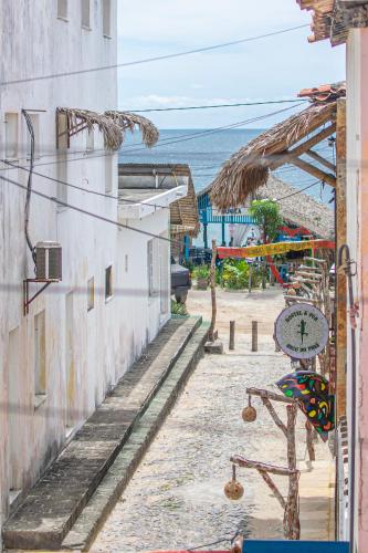 a view of an alleyway between two buildings at Hotel Preá in Prea