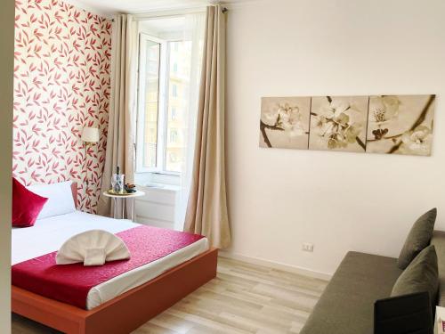 1 dormitorio con 1 cama con sombrero en Appia 52, en Roma
