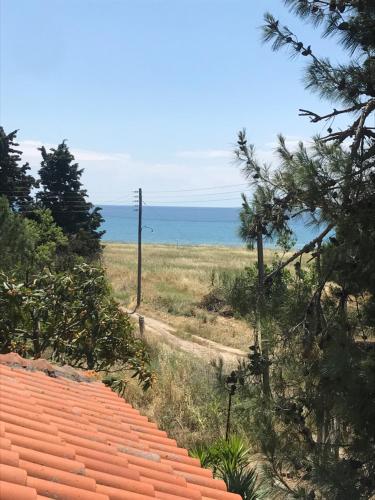 a view of the ocean from the roof of a house at Irini’s Attic in Nea Iraklia