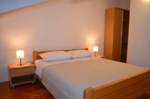 Posteľ alebo postele v izbe v ubytovaní Apartman Frane Krk