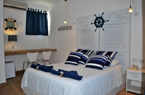 Ein Bett oder Betten in einem Zimmer der Unterkunft Hotel Coco Rio "City Center"