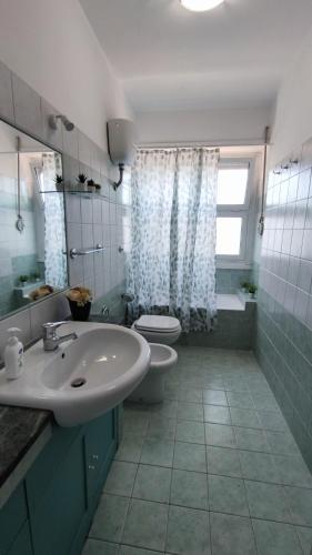 Koupelna v ubytování Gio apartment Marconi