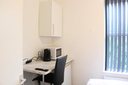Televisyen dan/atau pusat hiburan di St Peter's Shared House