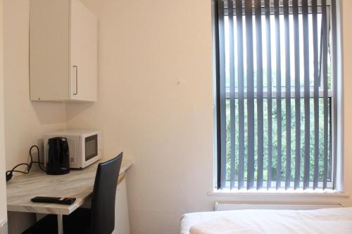 Katil atau katil-katil dalam bilik di St Peter's Shared House