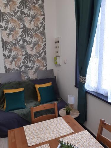 Ruang duduk di STUDIOS ET APPARTEMENTS EN CENTRE VILLE Boulogne sur mer
