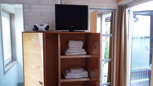 TV a/nebo společenská místnost v ubytování Forrent-ee