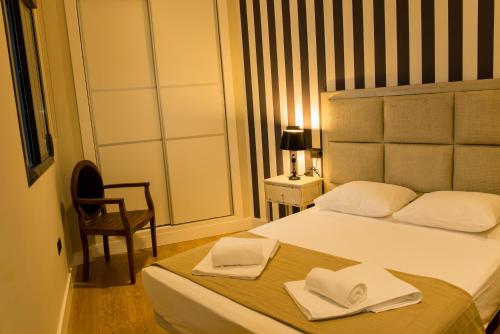 Letto o letti in una camera di AB Apartamentos Museum