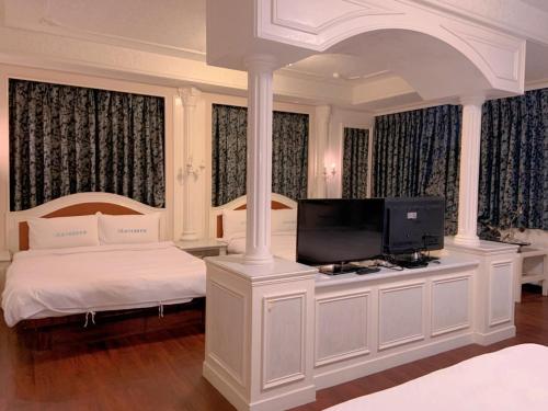 Μια τηλεόραση ή/και κέντρο ψυχαγωγίας στο Traveler Hotel Taitung