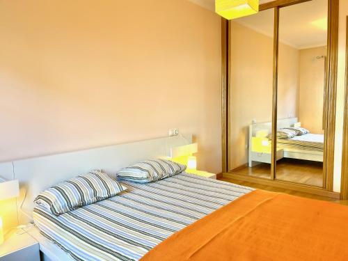 A bed or beds in a room at The Cliffs - Mansión del Indiano I