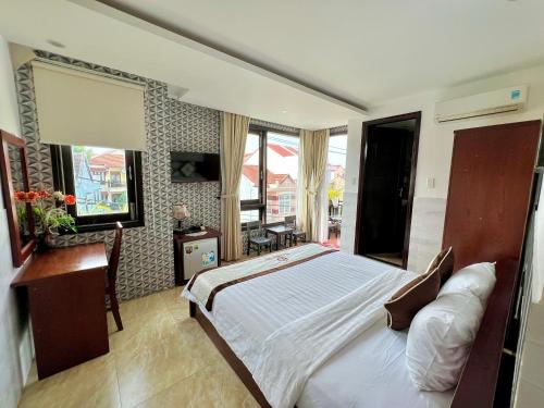 Katil atau katil-katil dalam bilik di Ngo House Villa