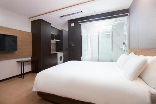 Кровать или кровати в номере Utop Marina Hotel & Resort
