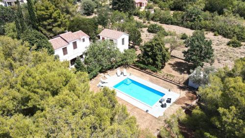 an aerial view of a house with a swimming pool at Holiday Home Jaga in Biograd na Moru