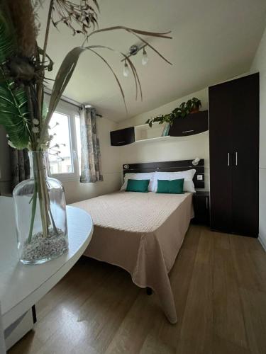 Letto o letti in una camera di Camping Village Tuscia Tirrenica