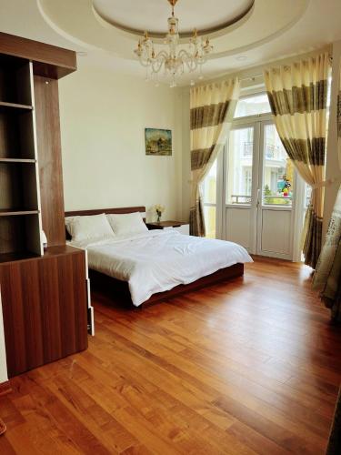 Ένα ή περισσότερα κρεβάτια σε δωμάτιο στο Villa Đà Lạt GD - Biệt Thự Đà Lạt GD Gần Hồ Xuân Hương Gần Chợ
