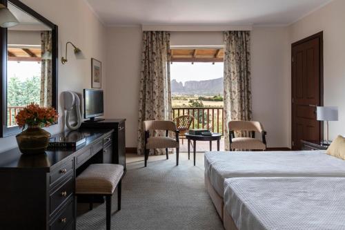 Postel nebo postele na pokoji v ubytování Amalia Hotel Kalambaka