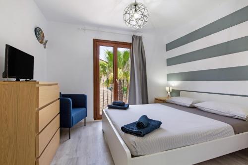 A bed or beds in a room at Gmar House relax y naturaleza