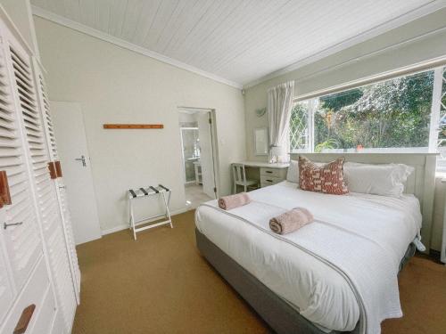 En eller flere senge i et værelse på Leisure Isle Holiday Home