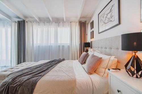 Voodi või voodid majutusasutuse Elite Luxury Sunset toas