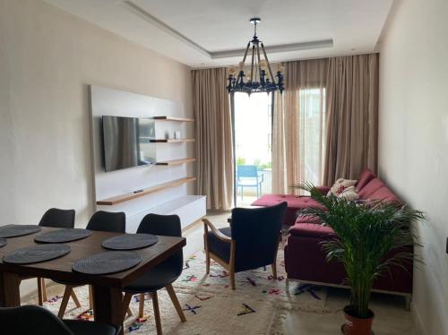 Posezení v ubytování Hivernage, Superbe appartement dans une résidence