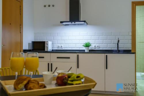 Kuchyňa alebo kuchynka v ubytovaní MALAGA CENTRAL SUITES - New Release